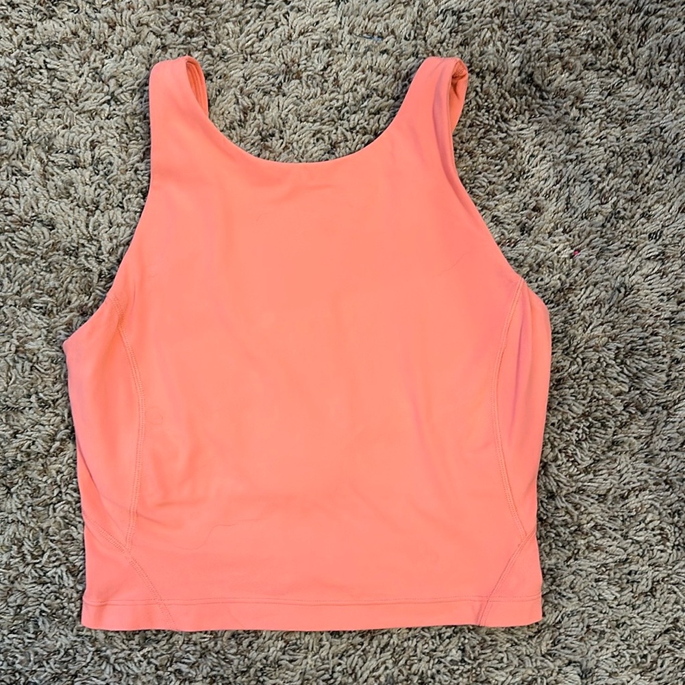 Lululemon pink cropped tank
Size 2